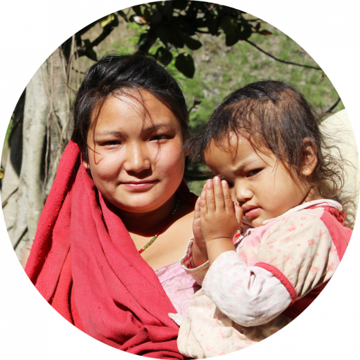Vrouw met kind Nepal rond