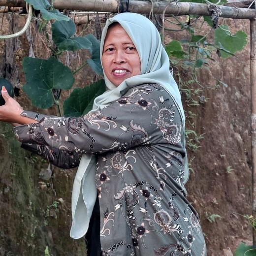 Minnie, voorzitter van het rampencommité in Plono